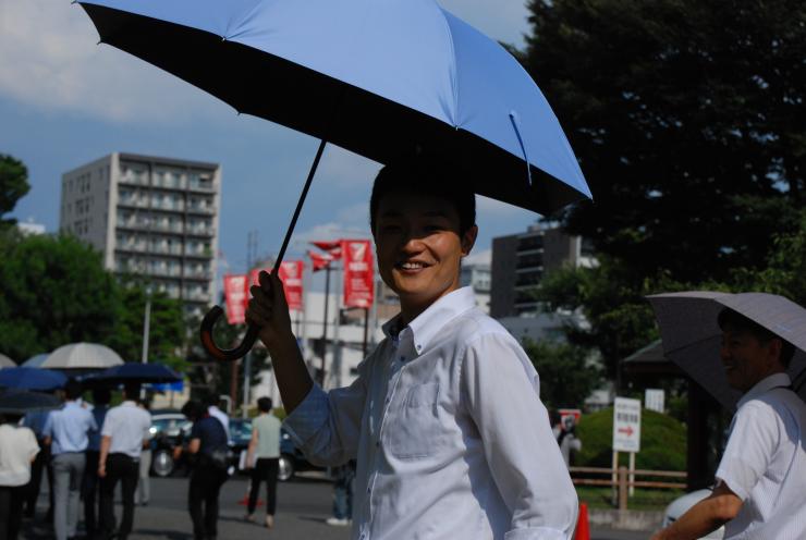 日傘男子